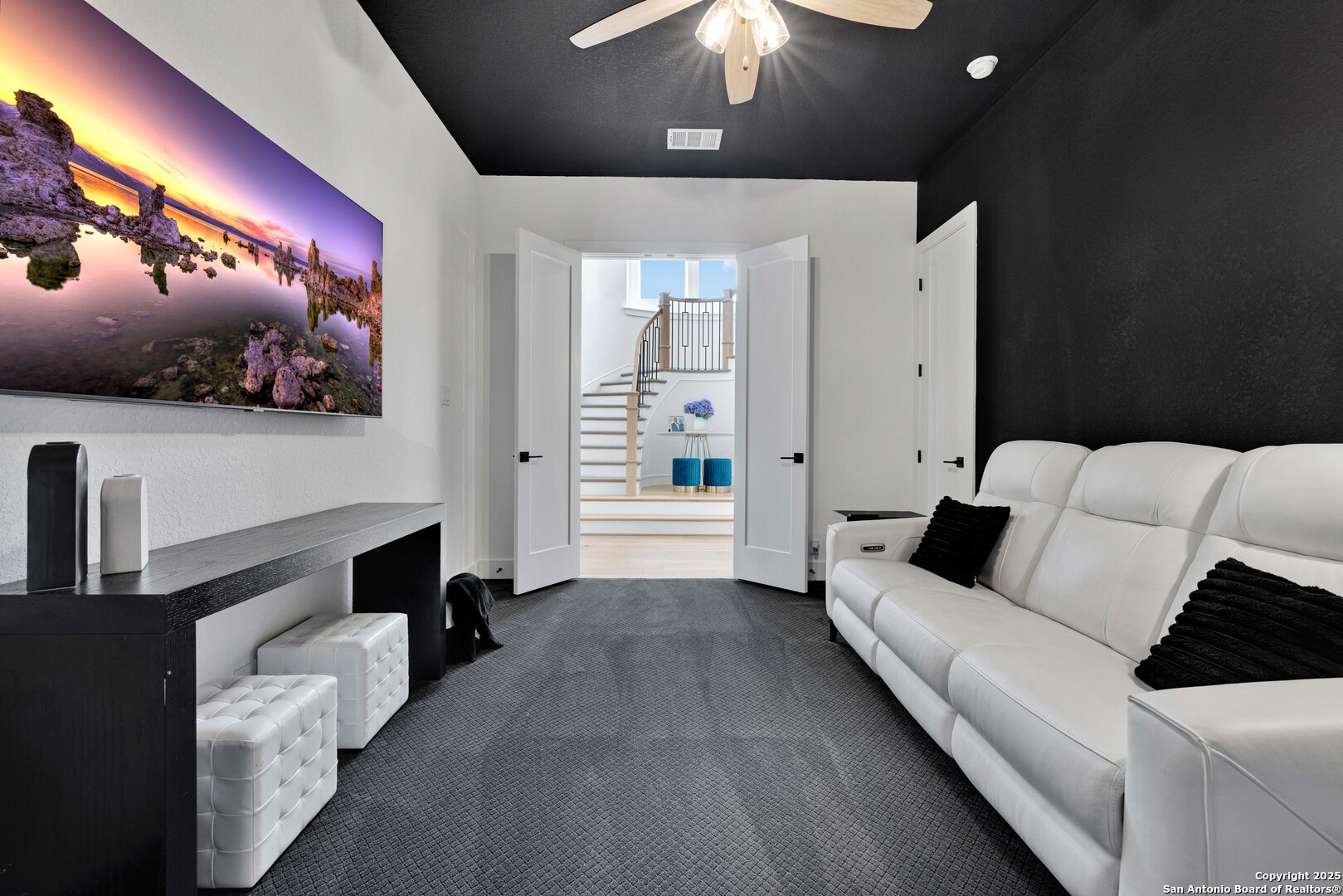 235 Corazon Boerne, TX 78006 - Photo 11 of 68 a living room with furniture and a flat screen tv