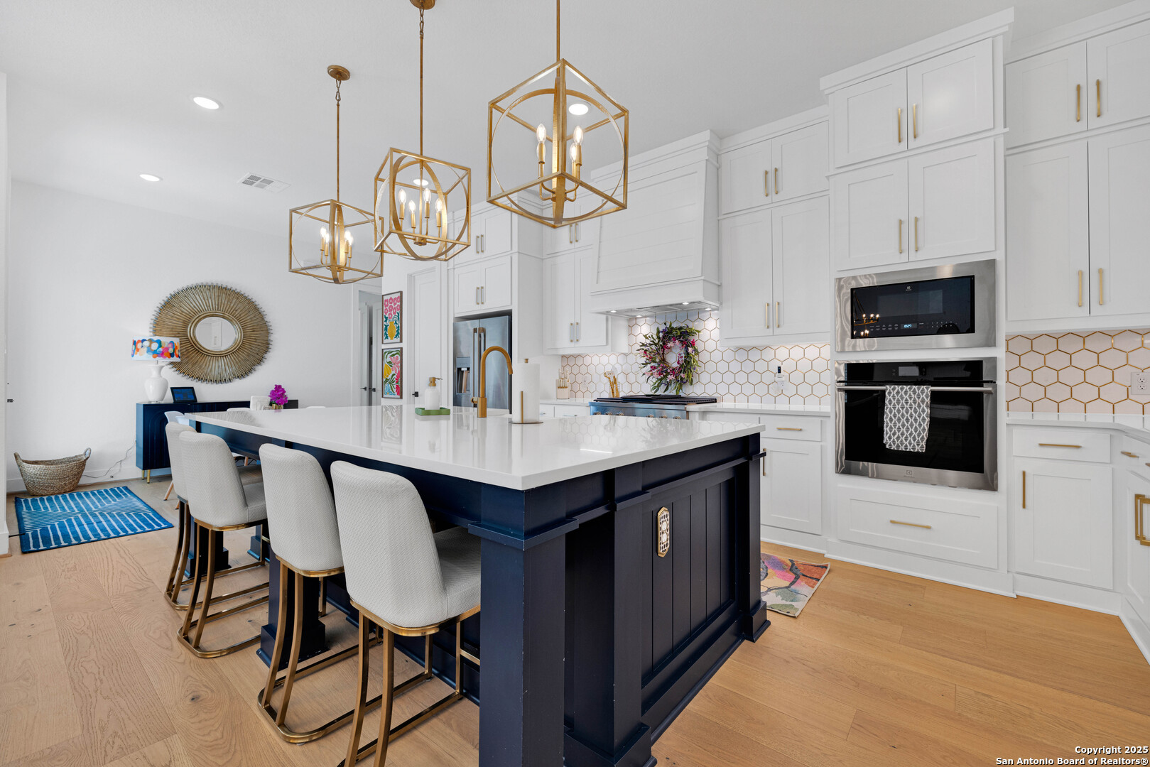 235 Corazon Boerne, TX 78006 - Photo 23 of 68 a kitchen with a dining table cabinets and stainless steel appliances