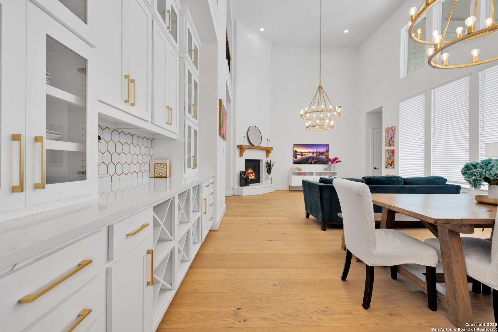 235 Corazon Boerne, TX 78006 - Photo 30 of 68 a dining room with furniture and a chandelier