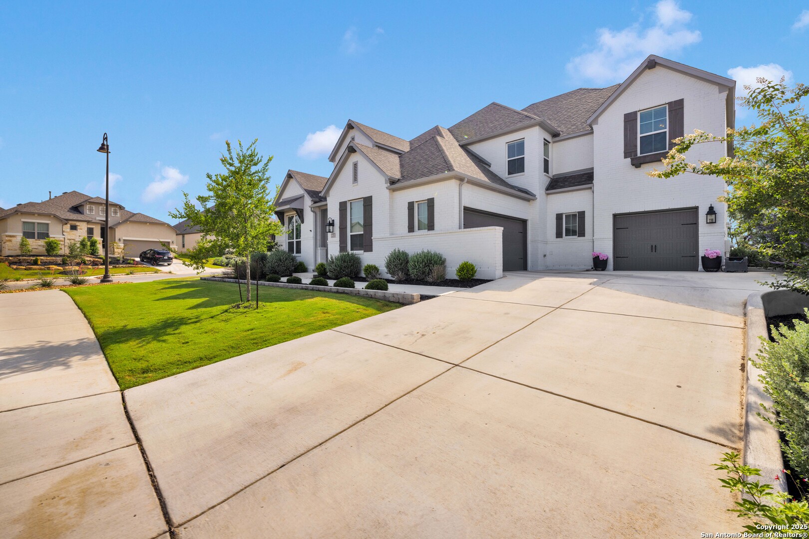 235 Corazon Boerne, TX 78006 - Photo 3 of 68 a front view of house with yard and green space