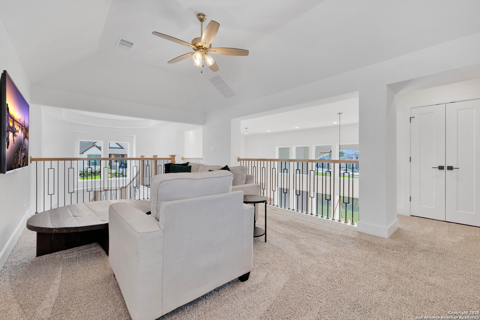 235 Corazon Boerne, TX 78006 - Photo 47 of 68 a living room with furniture and a table with wooden floor
