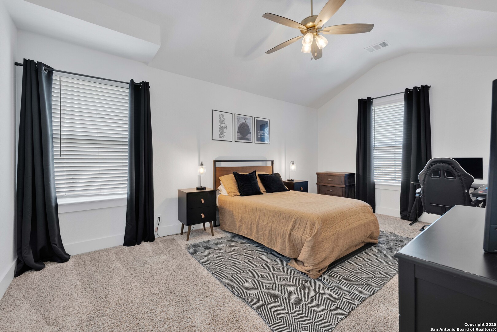 235 Corazon Boerne, TX 78006 - Photo 48 of 68 a bedroom with a large bed and ceiling fan