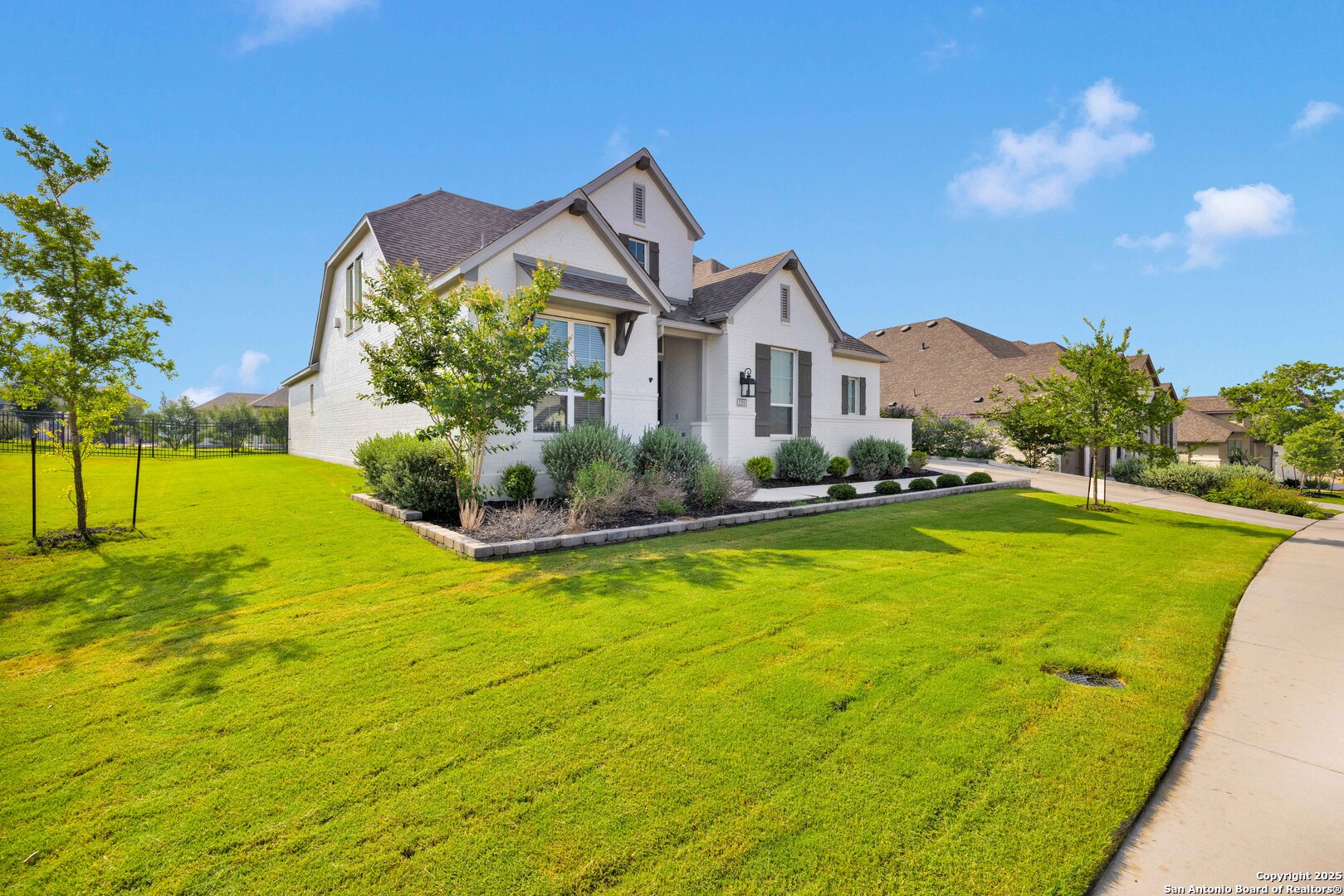 235 Corazon Boerne, TX 78006 - Photo 5 of 68 a front view of house with swimming pool
