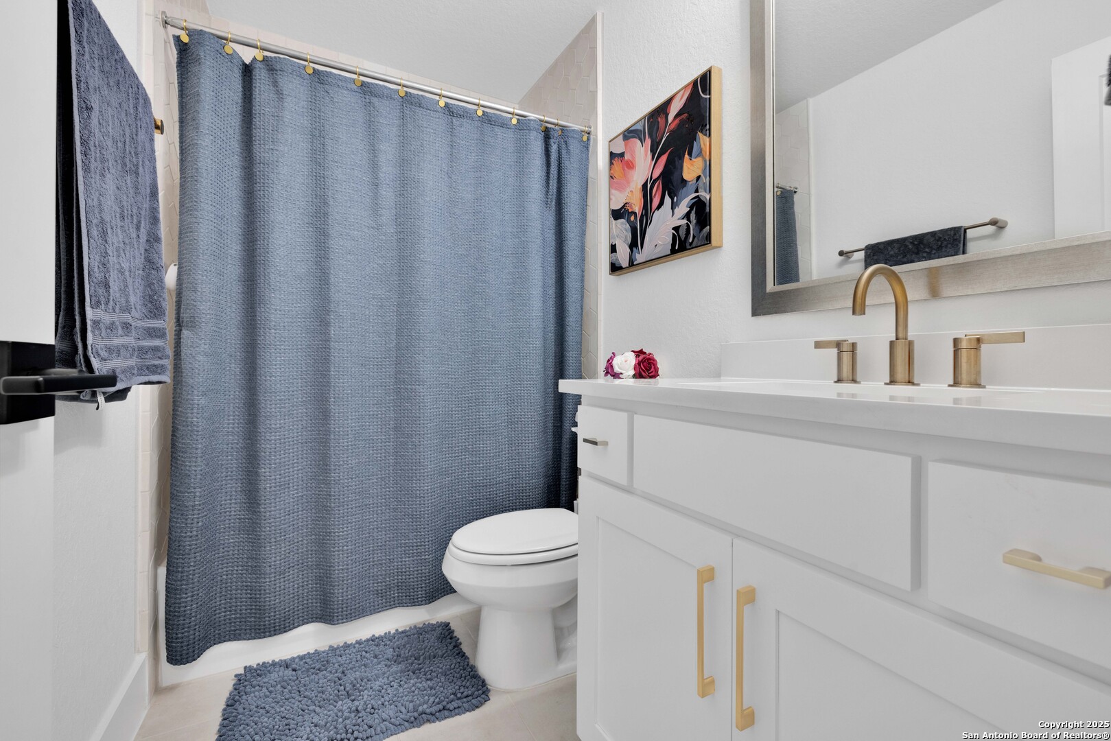 235 Corazon Boerne, TX 78006 - Photo 53 of 68 a bathroom with a toilet a sink and curtain