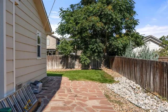 a backyard of a house with lots of green space