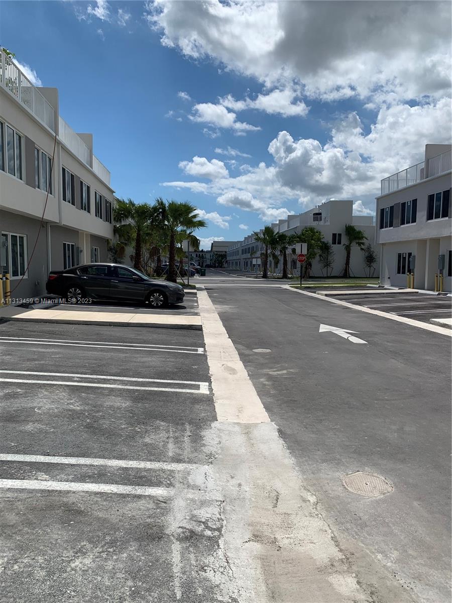 25680 Southwest 143rd Avenue Homestead, FL 33032 - Photo 11 of 20 a view of a city street from a building