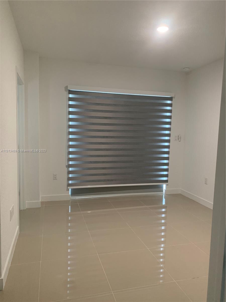25680 Southwest 143rd Avenue Homestead, FL 33032 - Photo 16 of 20 a view of empty room