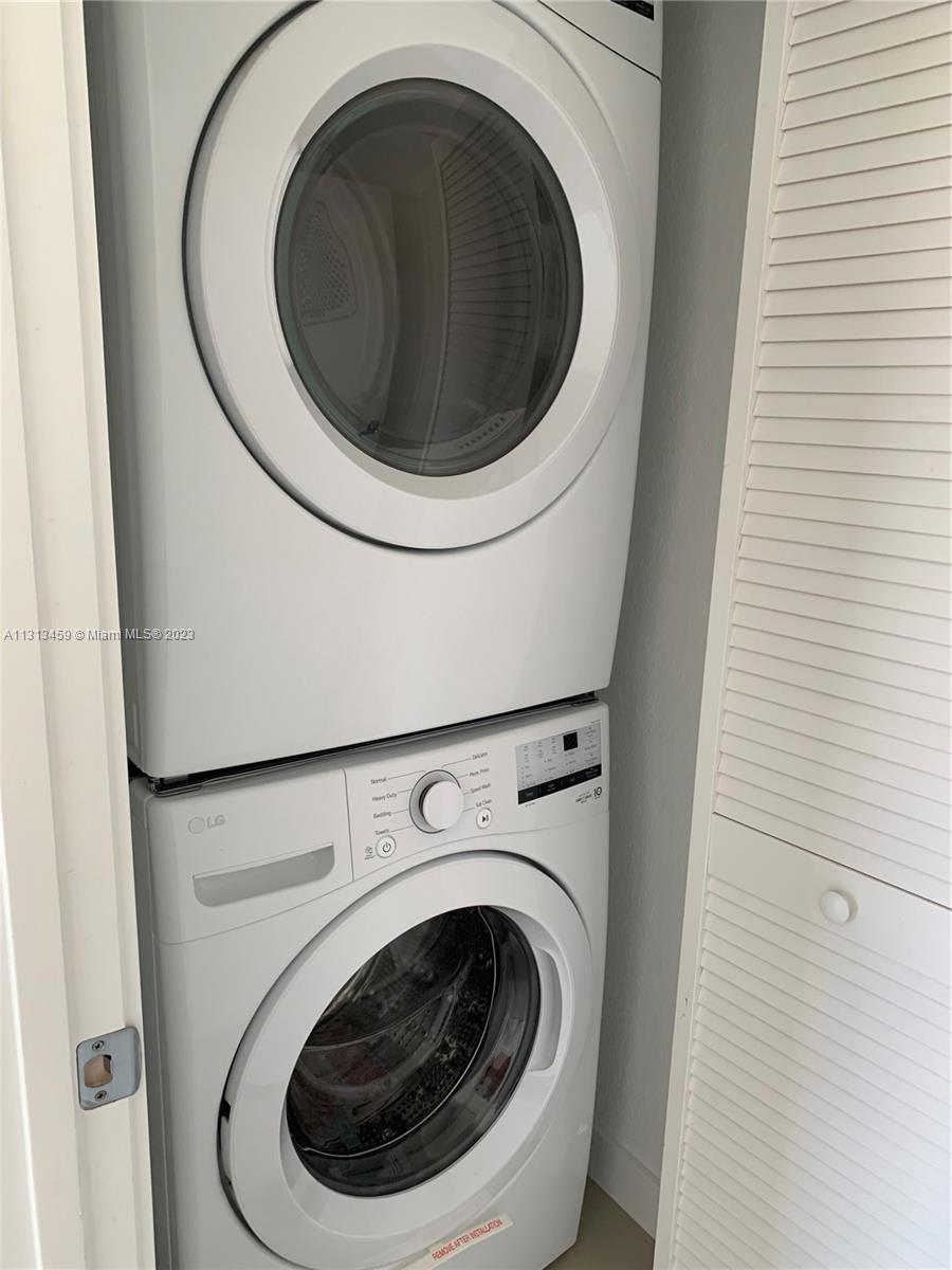25680 Southwest 143rd Avenue Homestead, FL 33032 - Photo 9 of 20 a close up view of a washer and dryer