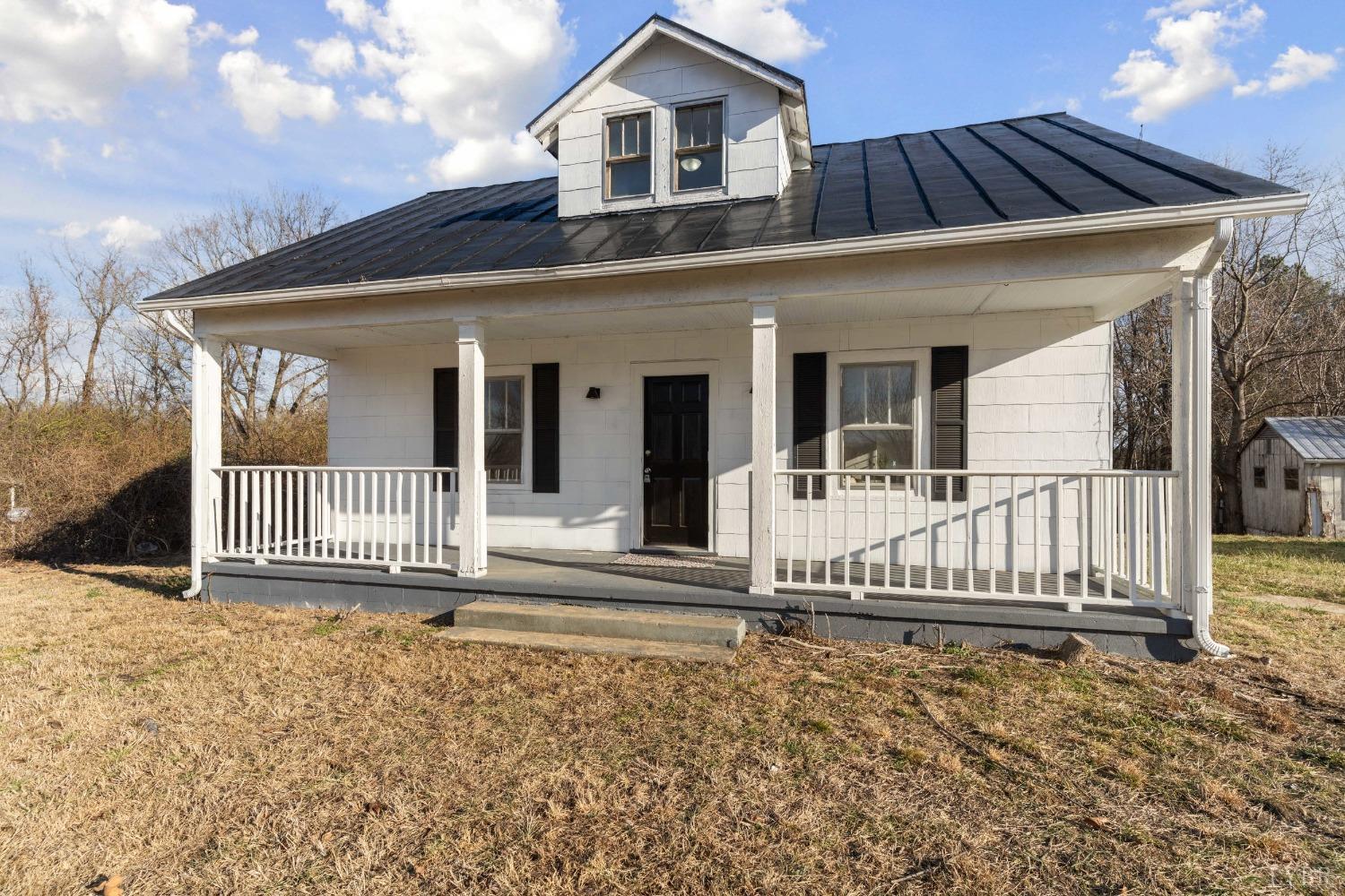 4769 Spring Garden Road Chatham, VA 24531 - Photo 1 of 44 front view of a house with a small yard