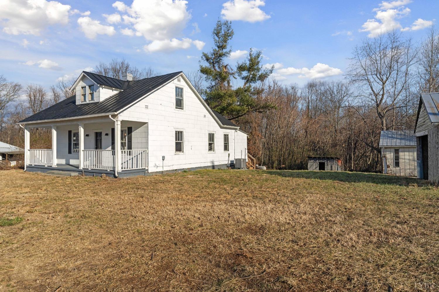 4769 Spring Garden Road Chatham, VA 24531 - Photo 36 of 44 a view of a house with a yard