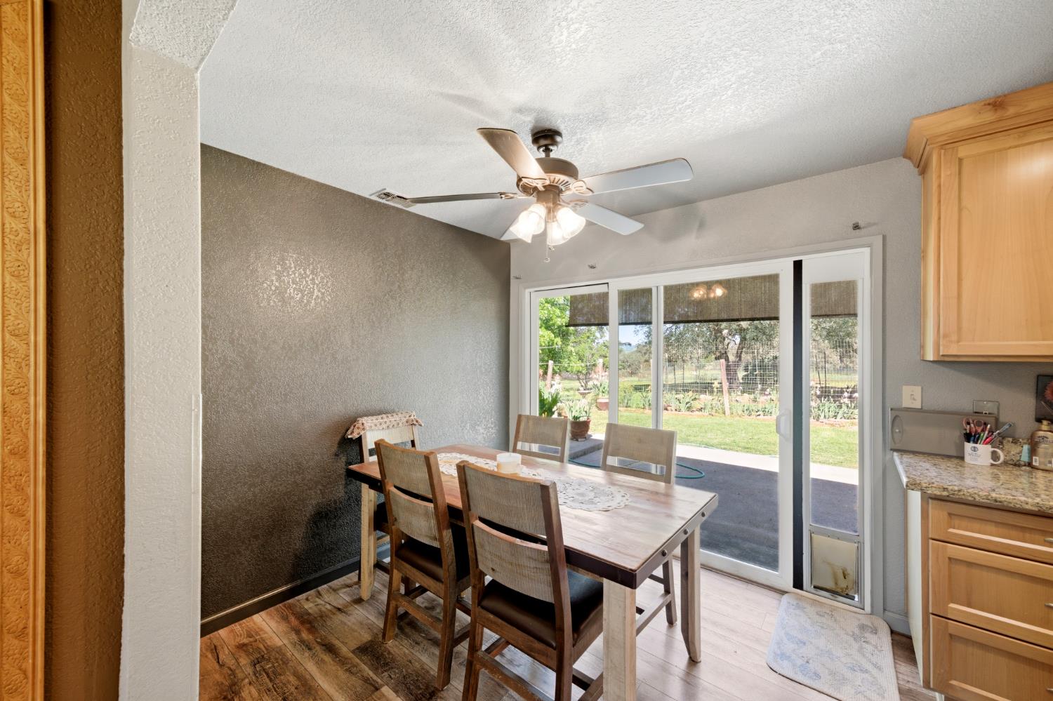 15828 Barney Road Plymouth, CA 95669 - Photo 12 of 71 a view of a dining room with furniture window and outside view