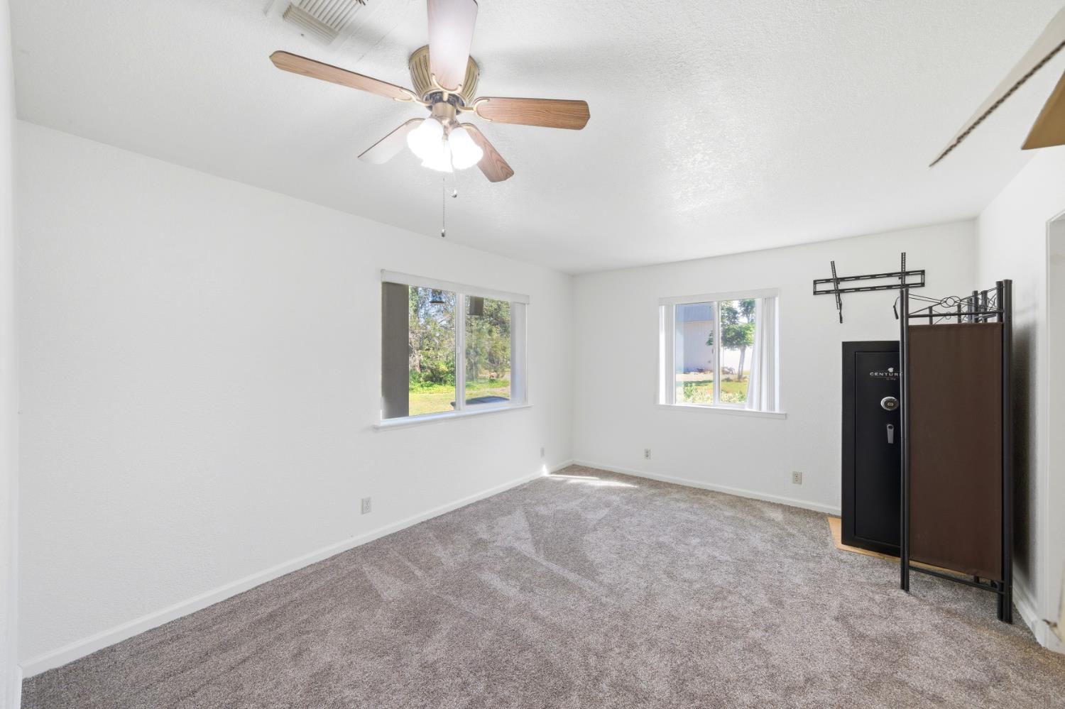 15828 Barney Road Plymouth, CA 95669 - Photo 20 of 71 a view of an empty room with a window