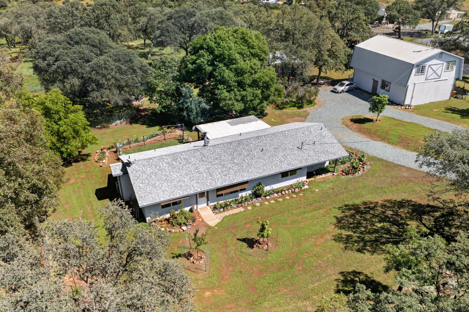 15828 Barney Road Plymouth, CA 95669 - Photo 4 of 71 an aerial view of a house with a yard