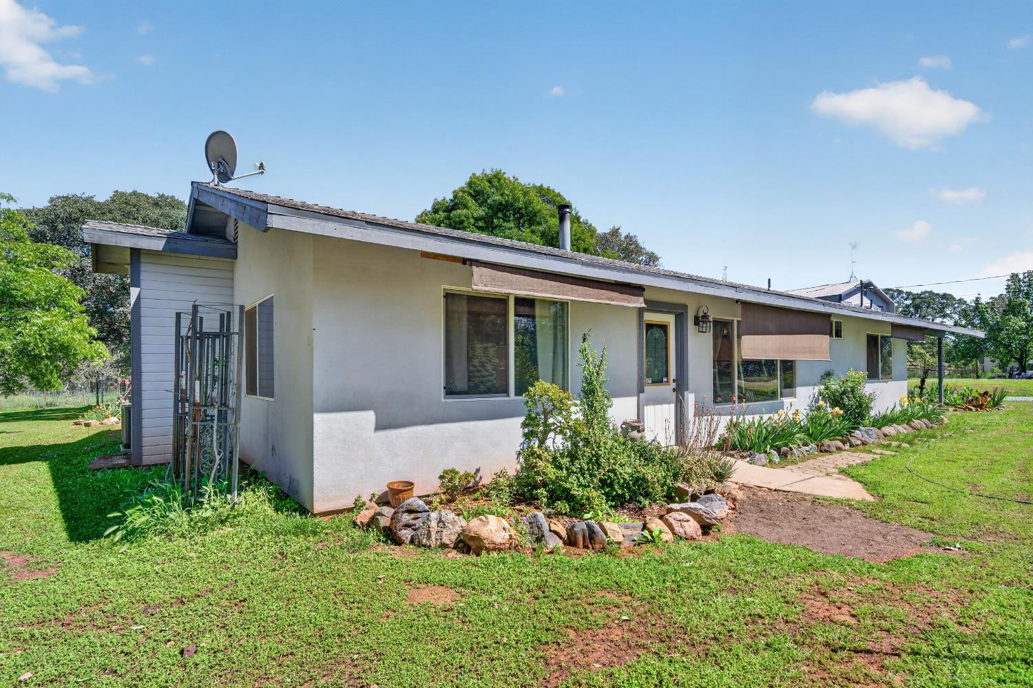 15828 Barney Road Plymouth, CA 95669 - Photo 50 of 71 front view of a house with a yard