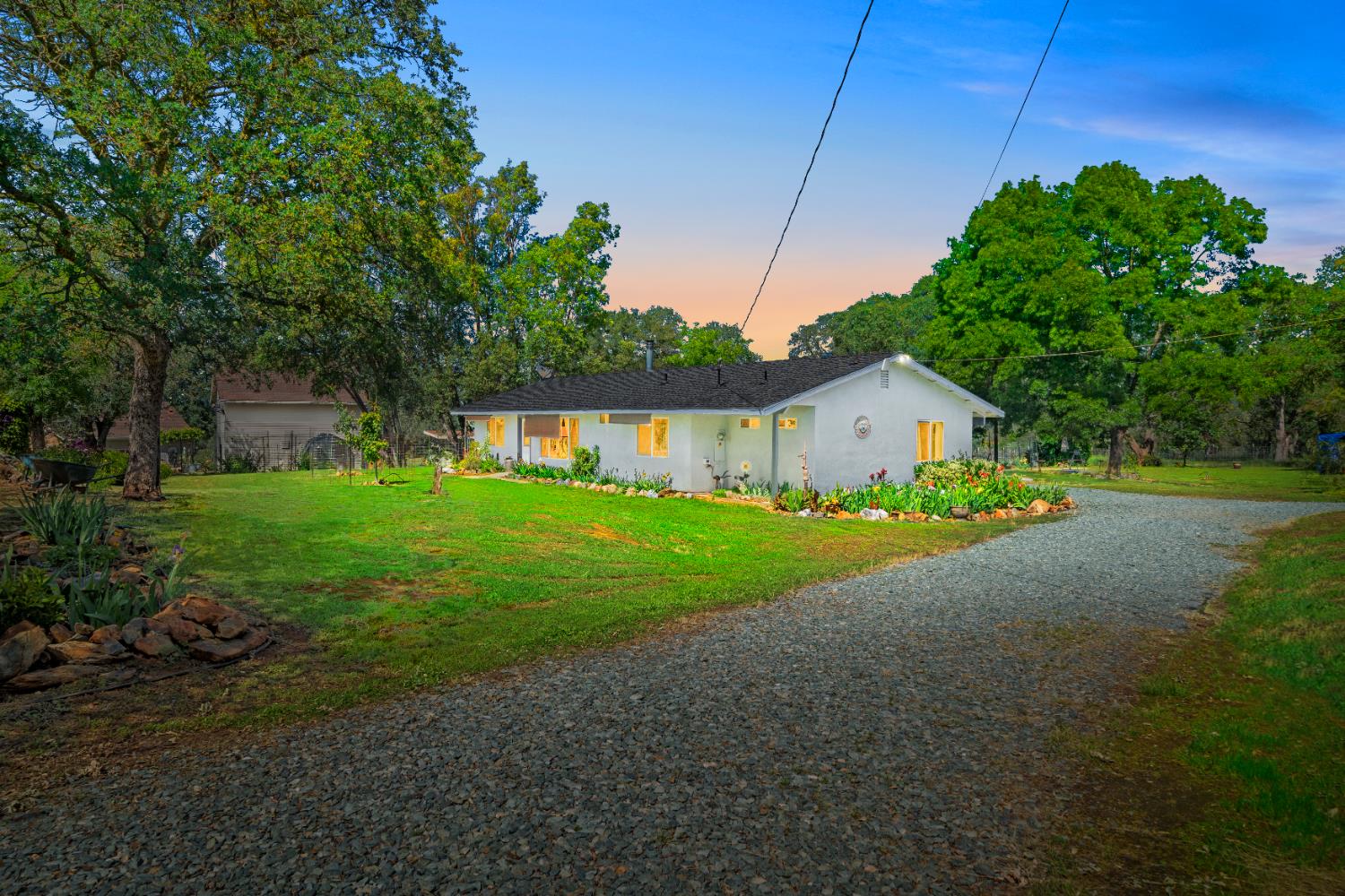 15828 Barney Road Plymouth, CA 95669 - Photo 69 of 71 a front view of house with backyard and green space