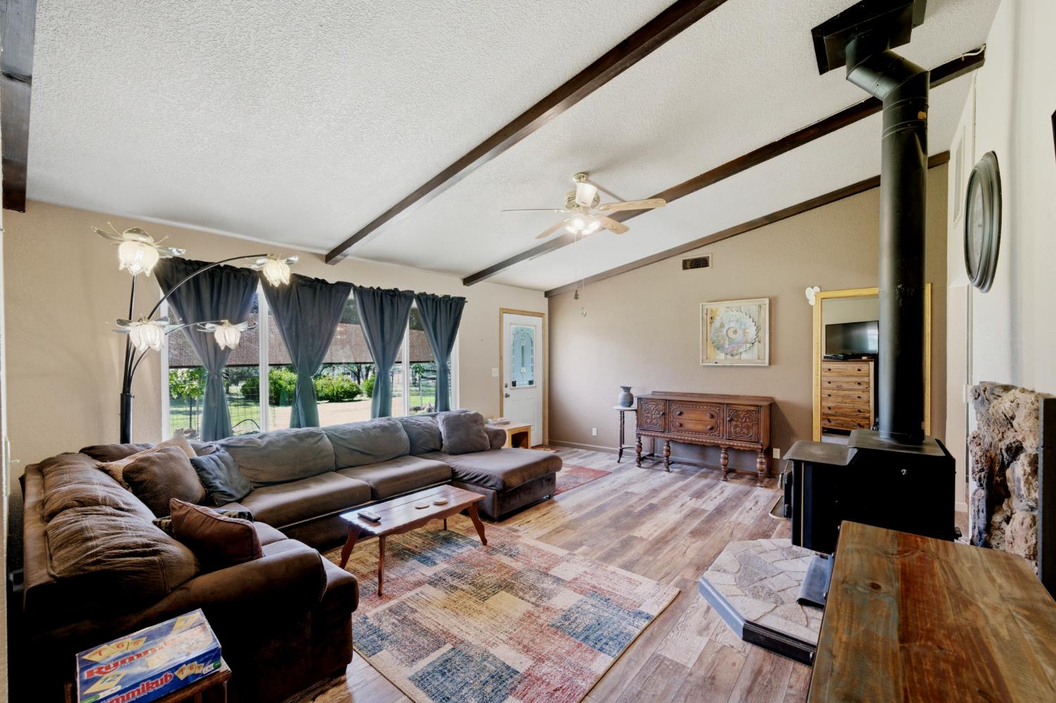 15828 Barney Road Plymouth, CA 95669 - Photo 7 of 71 a living room with furniture or couch and a large window