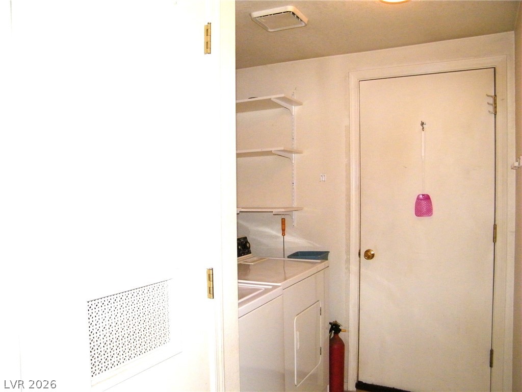 1010 East 75th Street Ely, NV 89301 - Photo 19 of 23 Laundry room with door to garage