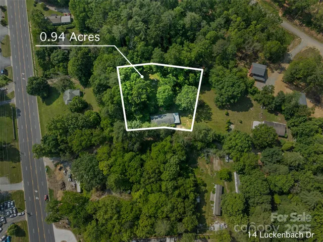 a kitchen with granite countertop cabinets stainless steel appliances and a sink