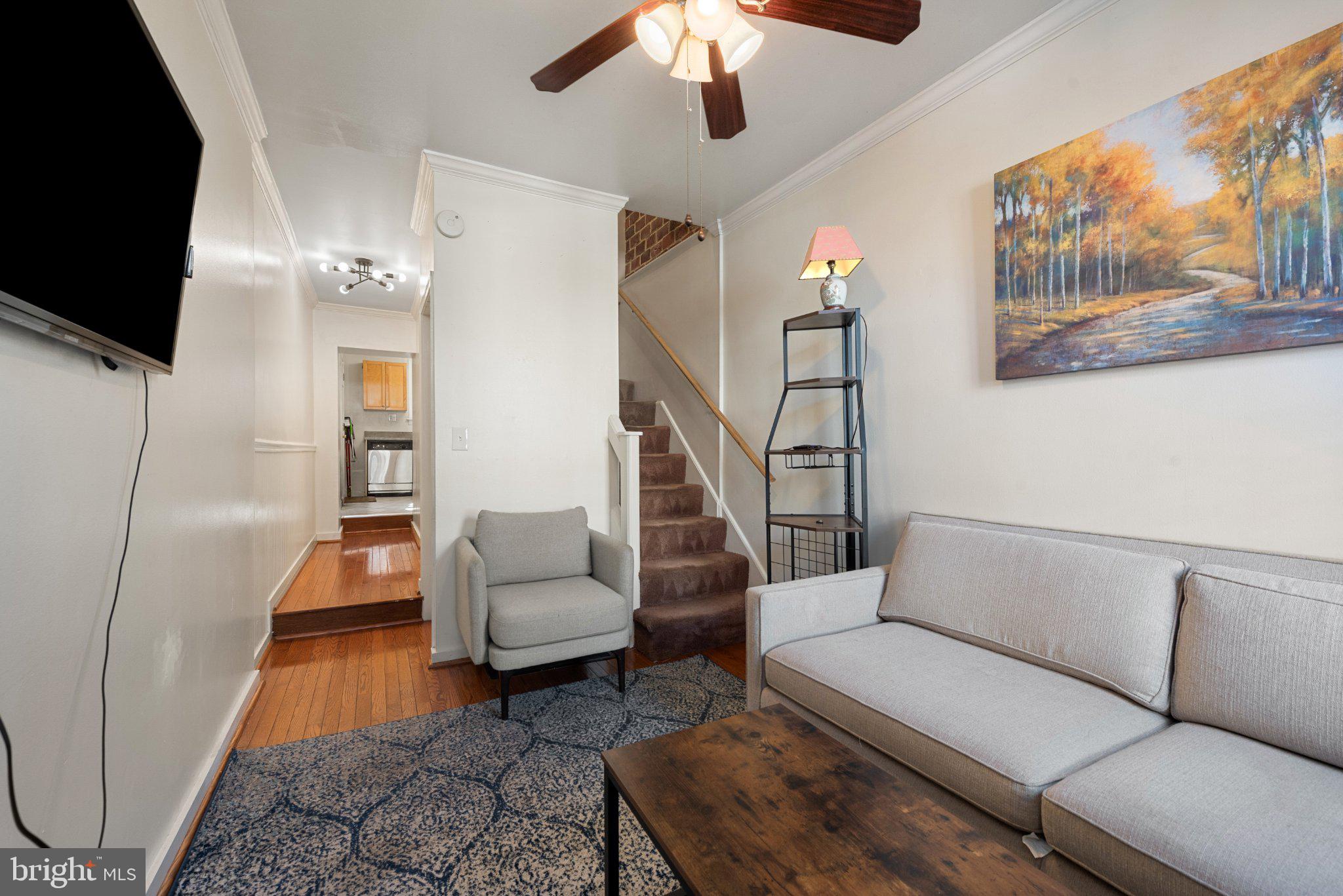 211 South Madeira Street Baltimore, MD 21231 - Photo 4 of 18 Charming living space with cozy vibes.