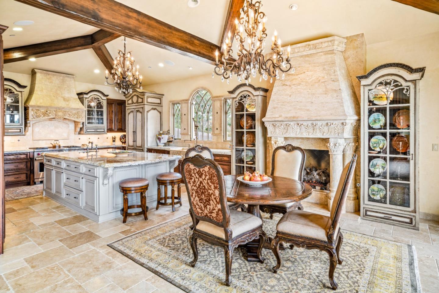 1519 Riata Road Pebble Beach, CA 93953 - Photo 15 of 75 a view of a dining room with furniture and a chandelier