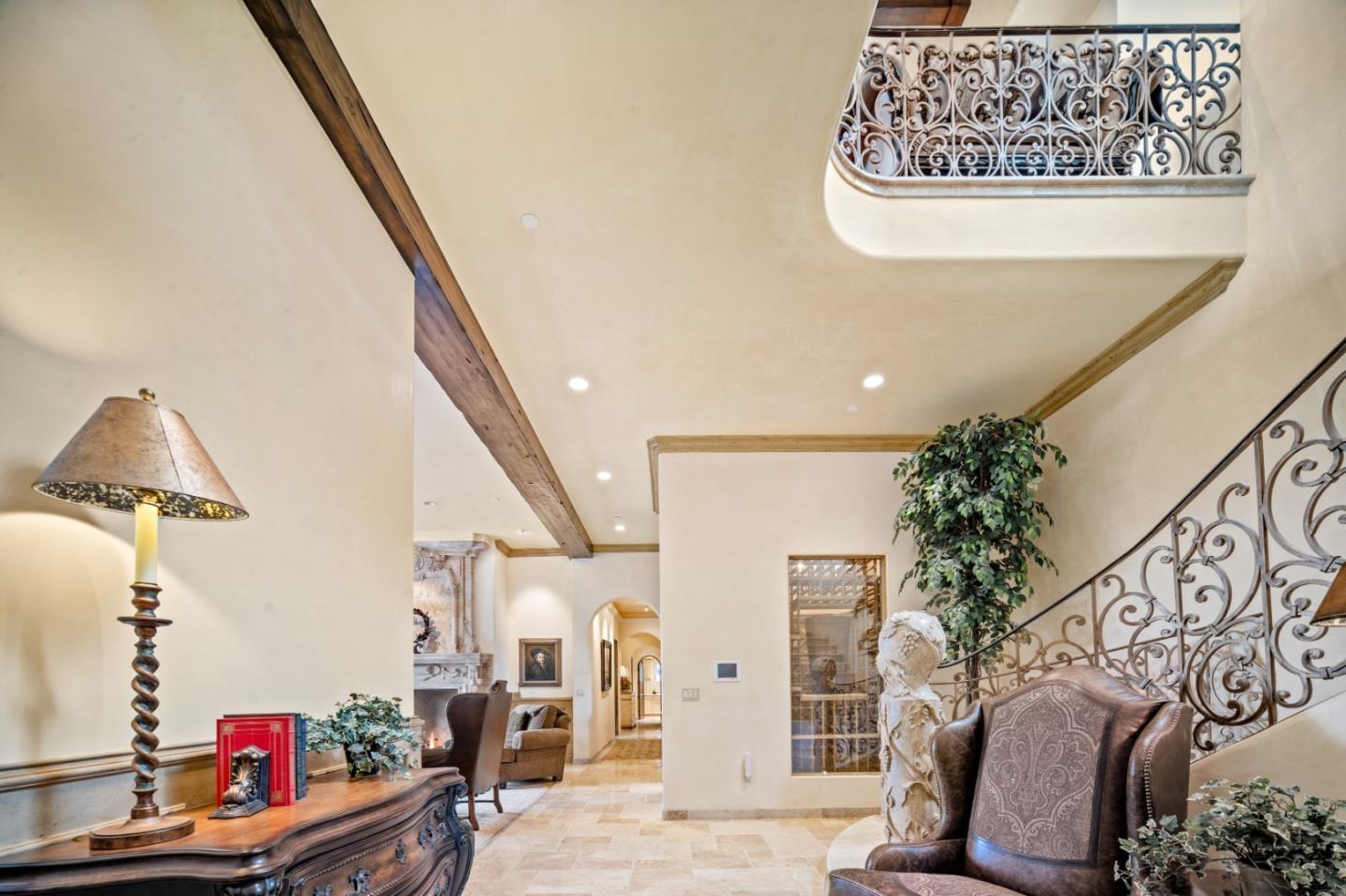 1519 Riata Road Pebble Beach, CA 93953 - Photo 40 of 75 a living room with furniture and stairs