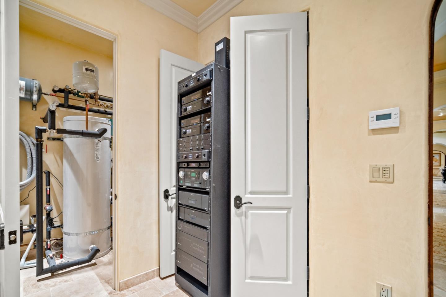 1519 Riata Road Pebble Beach, CA 93953 - Photo 63 of 75 a view of walk in closet with clothes