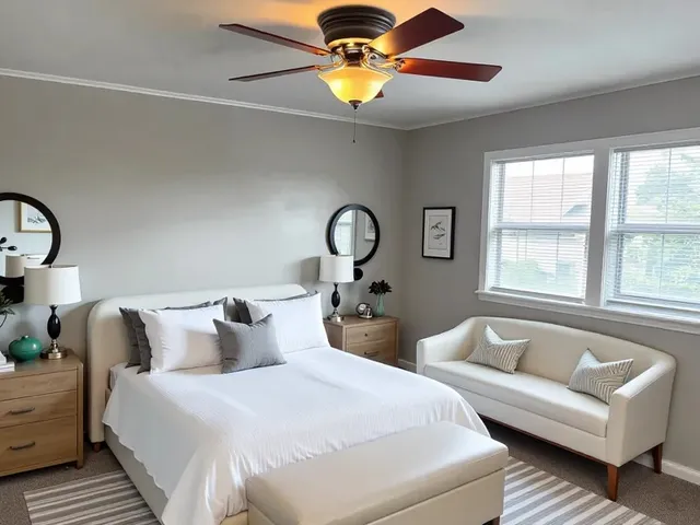 a bedroom with bed and a chandelier