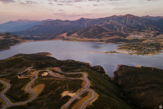 9269 North Sunset Road Kamas, UT 84036 - Photo 14 of 21 Expansive mountain landscape featuring a large body of water, meandering roads, and distant ski slopes