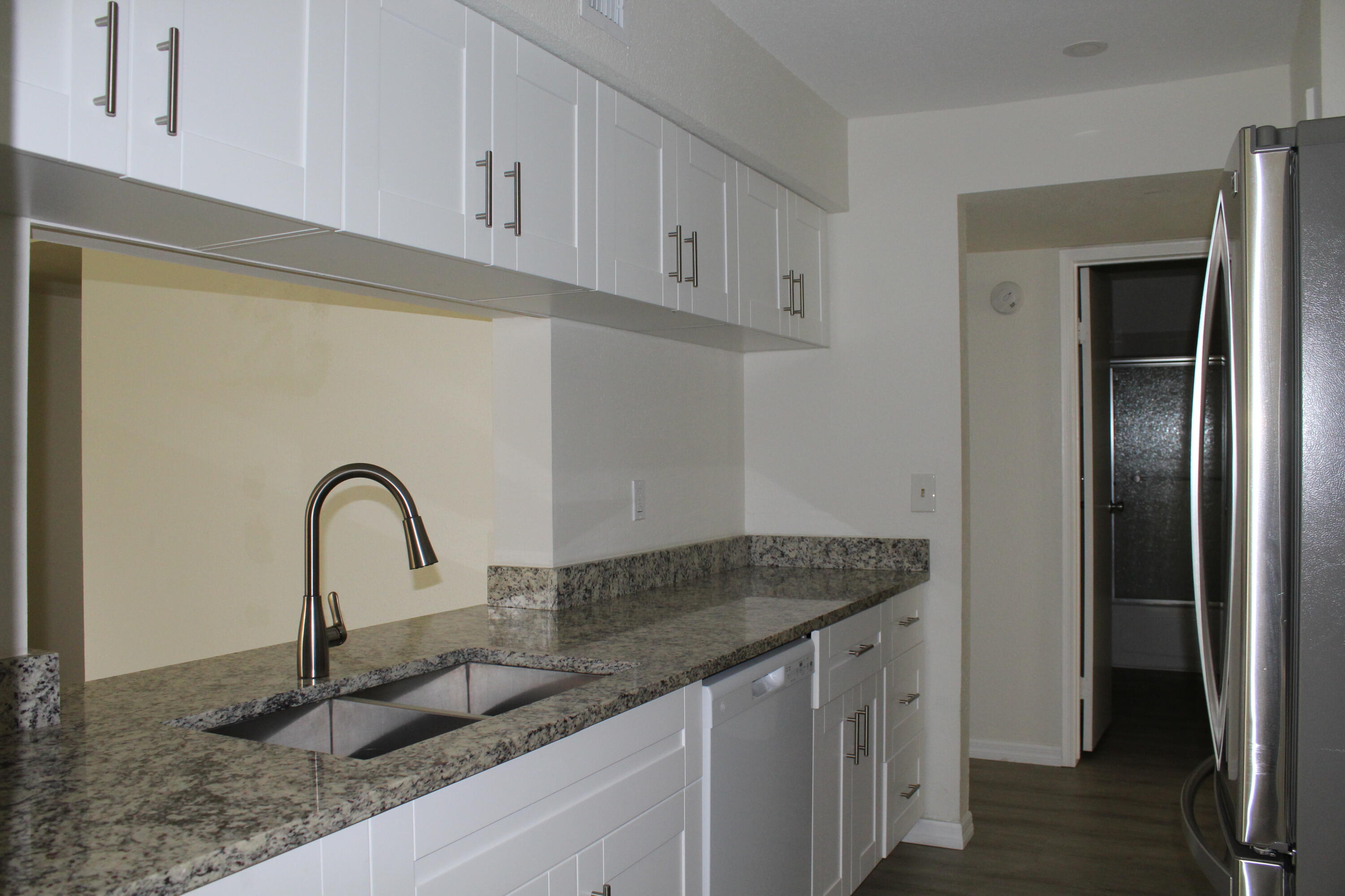 899 Riverside Drive, Unit 620 Coral Springs, FL 33071 - Photo 17 of 46 a close view of a sink and a kitchen counter space