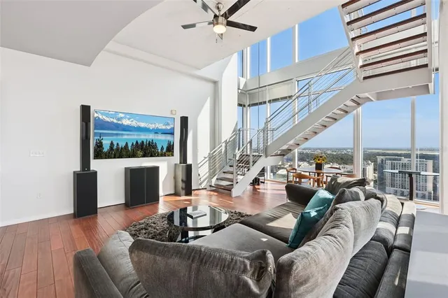 a view of a living room with a large window