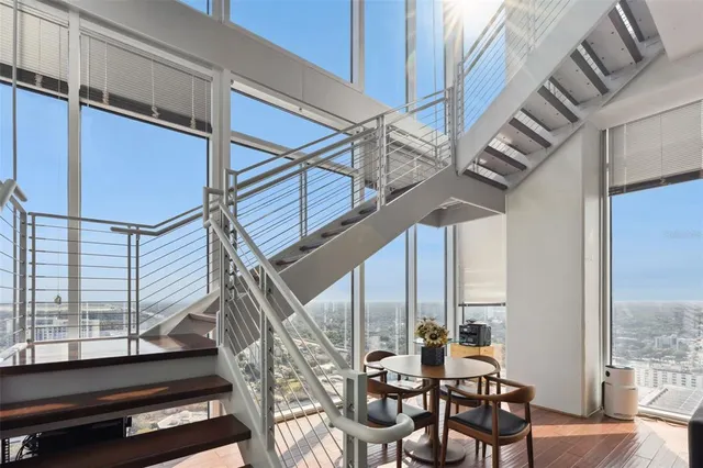 a bathroom with a granite countertop sink shower and a mirror