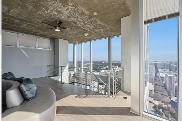 a view of a balcony with city