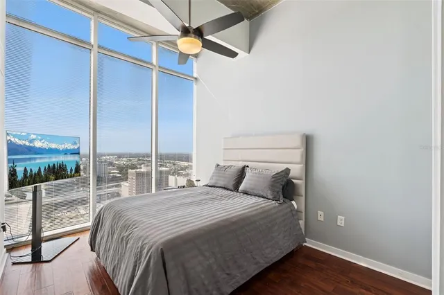 a front view of a building with a garden