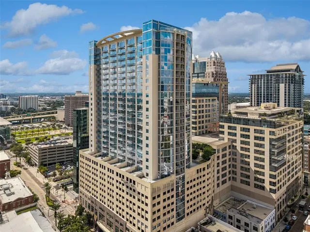 a view of a city with tall buildings