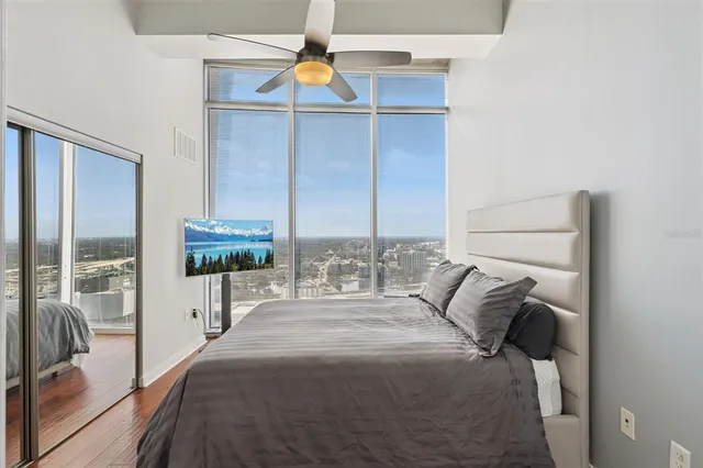 a living room with lots of furniture and a table