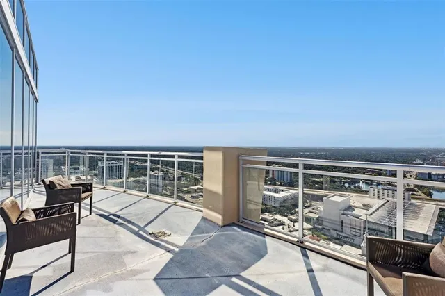 a view of a swimming pool with a patio