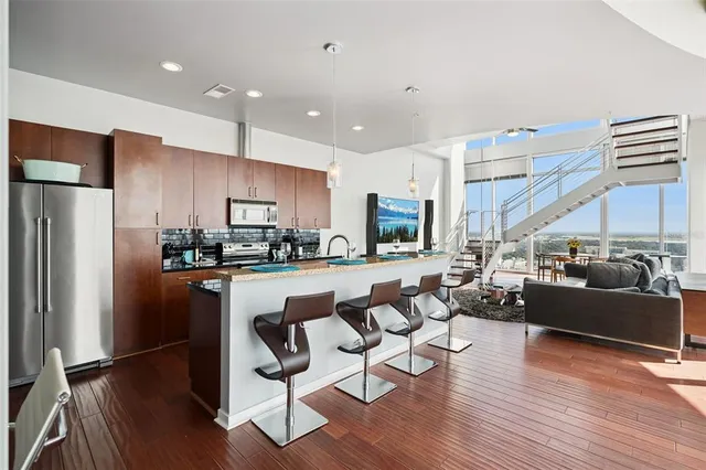 a living room with furniture and a view of living room