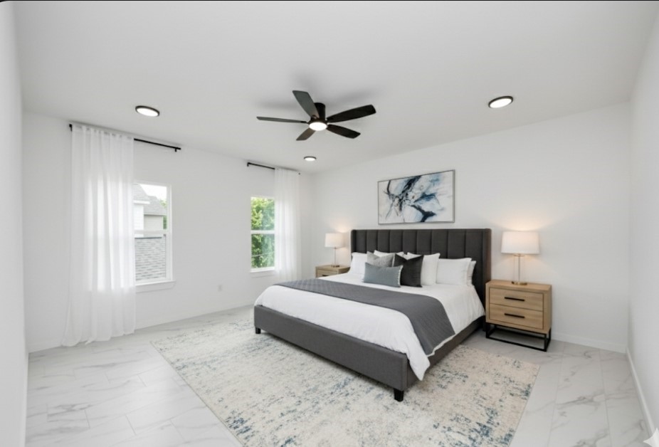 8023 Brandon Street Houston, TX 77051 - Photo 4 of 10 a bedroom with bed and window