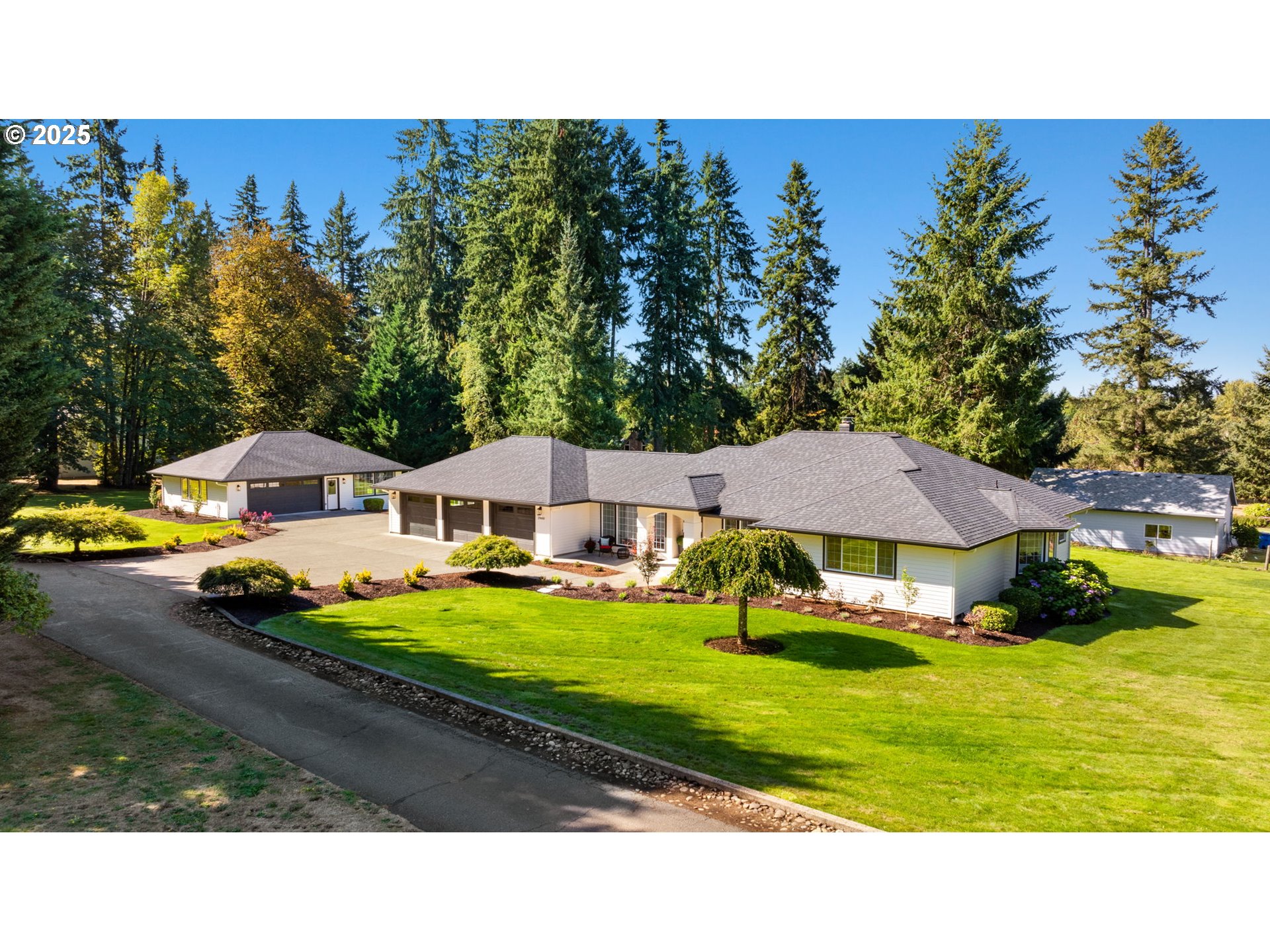 25600 Northeast 152nd Avenue Battle Ground, WA 98604 - Photo 1 of 48 a view of an house with garden space and street view