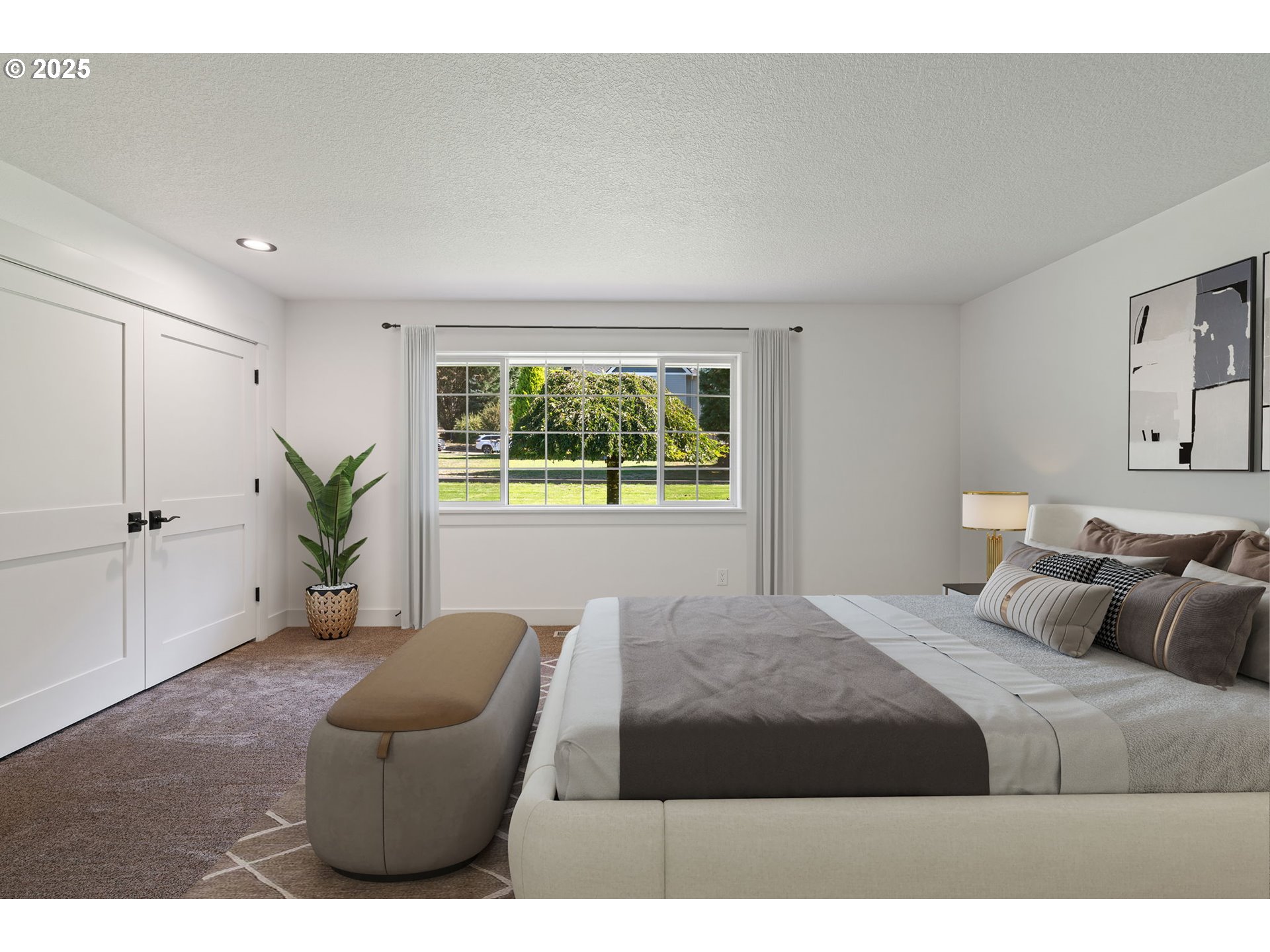 25600 Northeast 152nd Avenue Battle Ground, WA 98604 - Photo 17 of 48 a bedroom with a bed and a couch