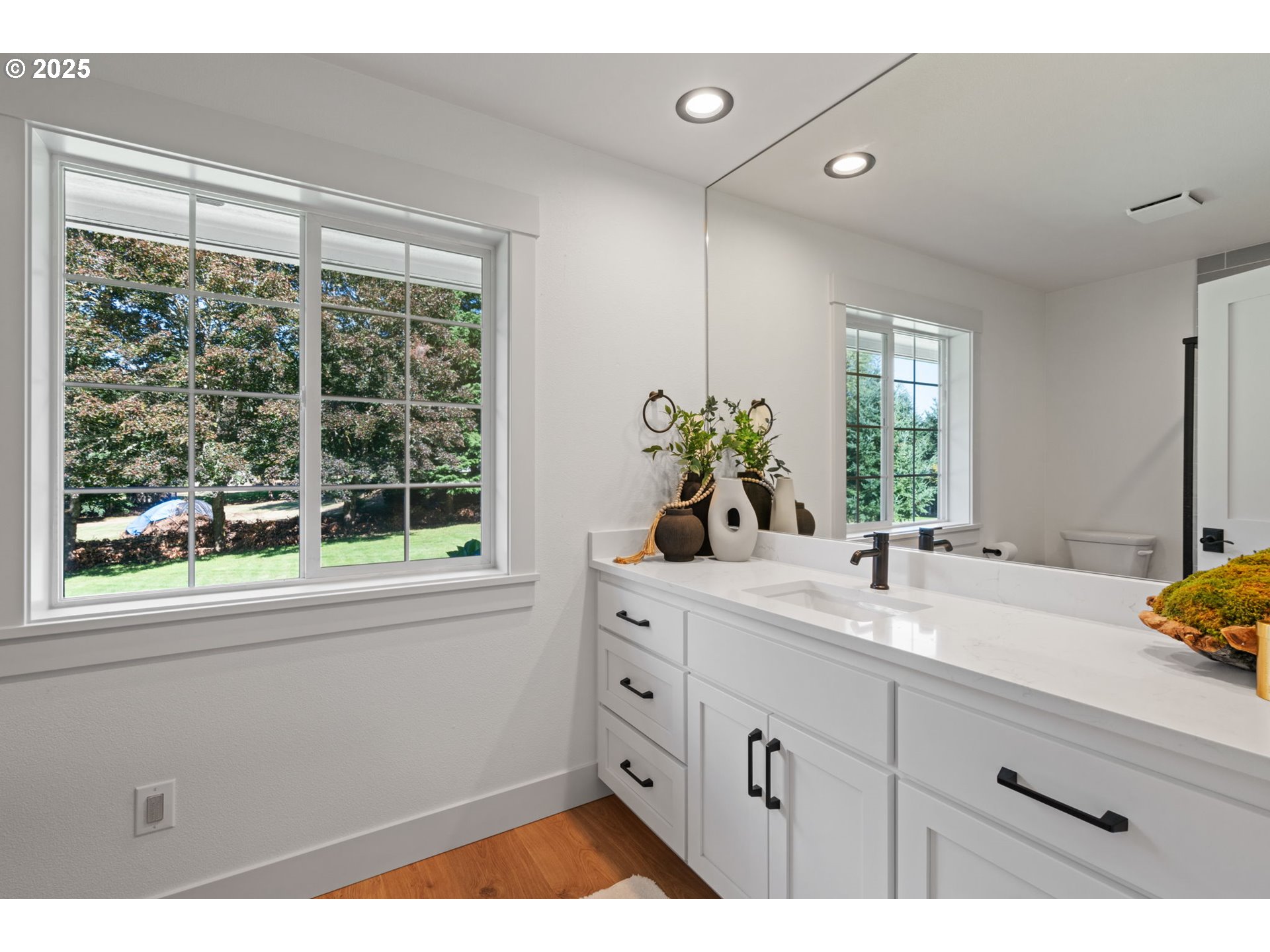 25600 Northeast 152nd Avenue Battle Ground, WA 98604 - Photo 25 of 48 a view of a bathroom sink and a window
