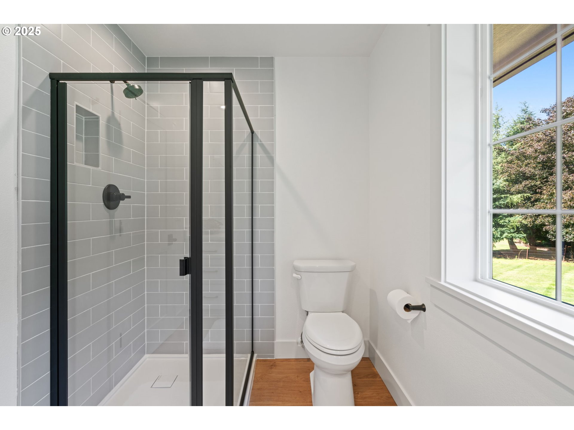 25600 Northeast 152nd Avenue Battle Ground, WA 98604 - Photo 26 of 48 a bathroom with a toilet a sink and a shower