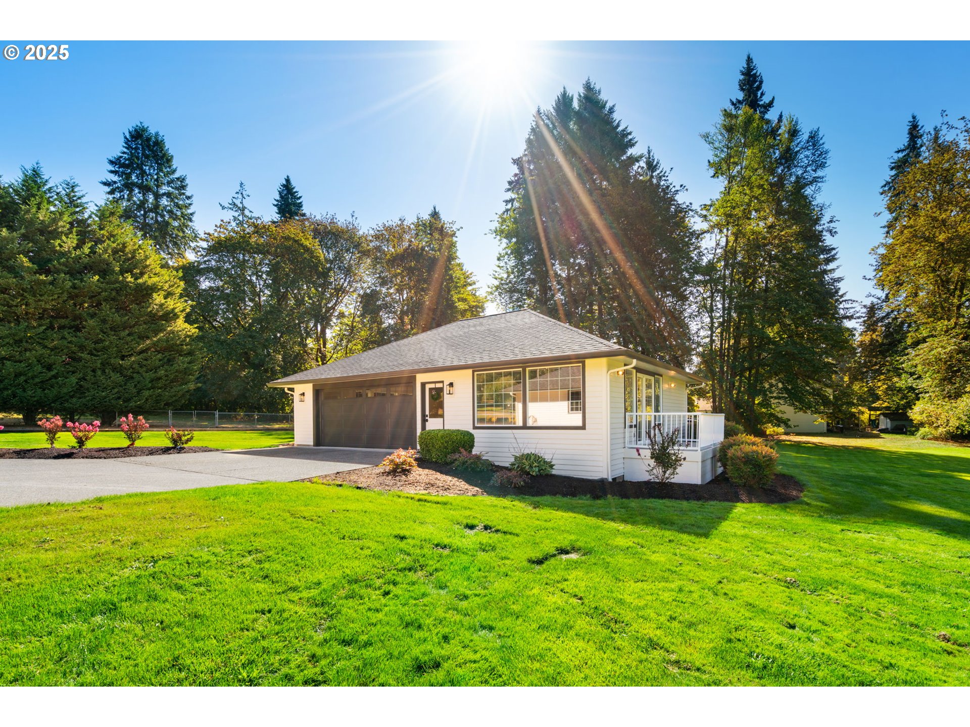 25600 Northeast 152nd Avenue Battle Ground, WA 98604 - Photo 31 of 48 a front view of a house with garden
