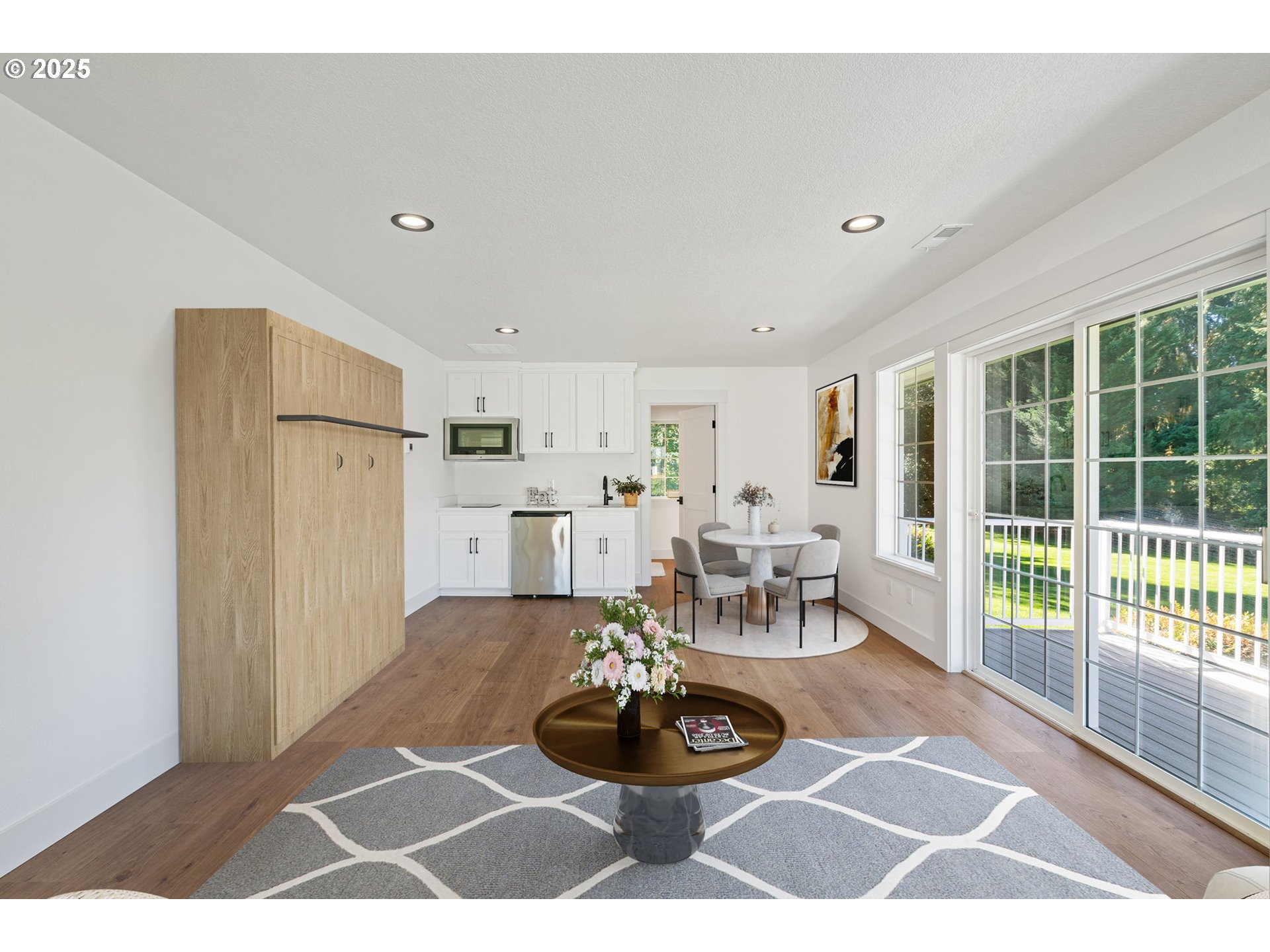25600 Northeast 152nd Avenue Battle Ground, WA 98604 - Photo 32 of 48 a living room with furniture and a dining table