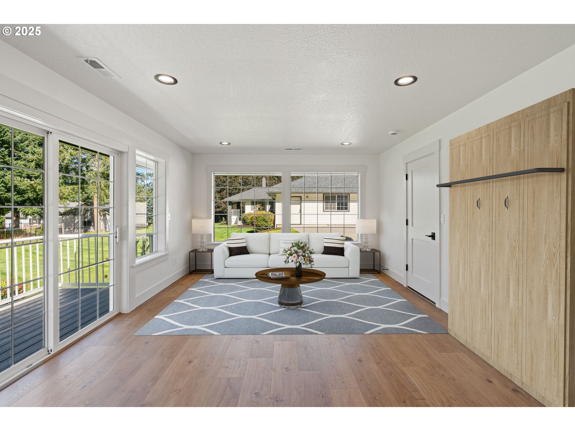 25600 Northeast 152nd Avenue Battle Ground, WA 98604 - Photo 33 of 48 a living room with furniture and a large window