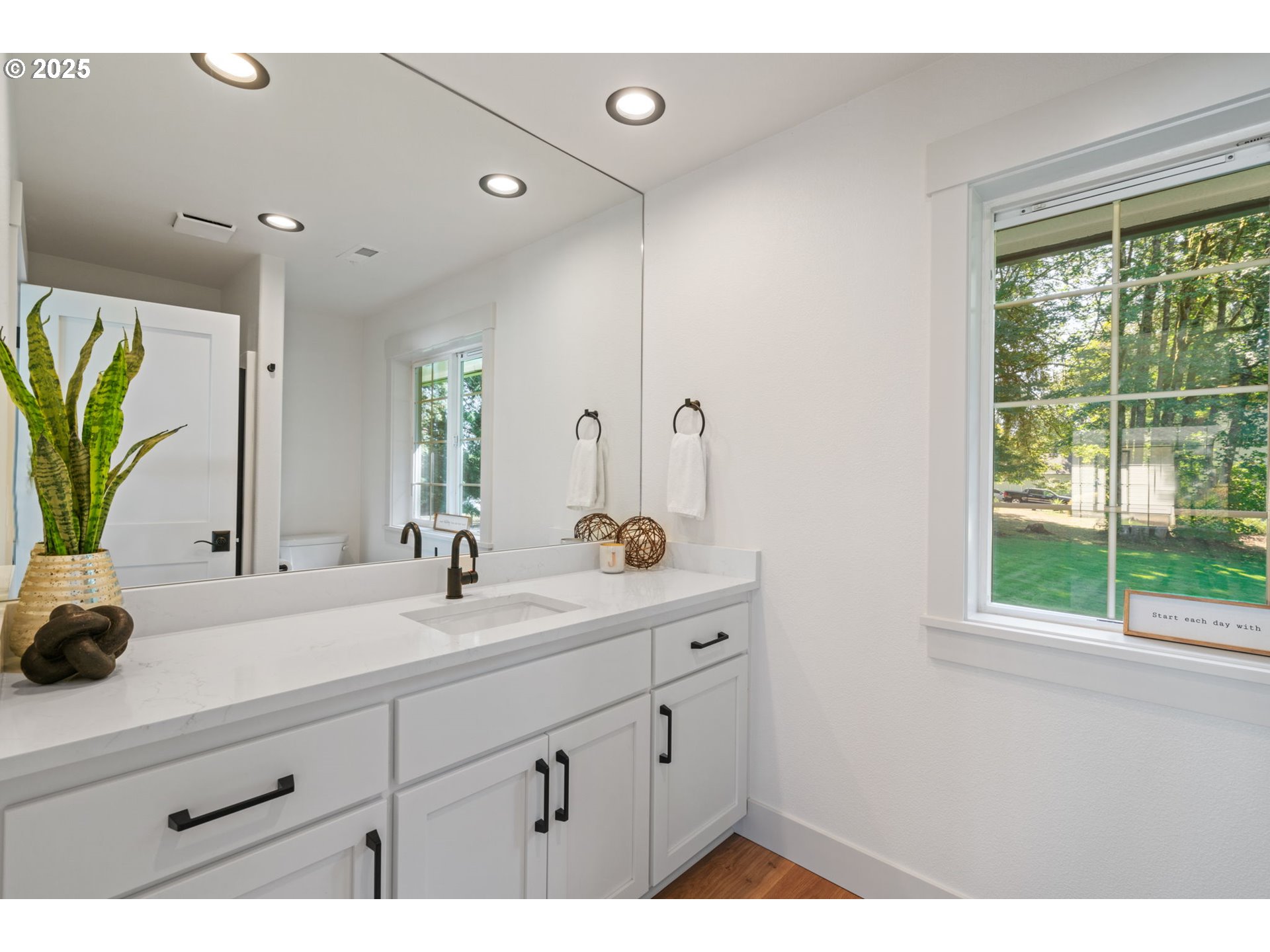 25600 Northeast 152nd Avenue Battle Ground, WA 98604 - Photo 37 of 48 a bathroom with a sink and a mirror