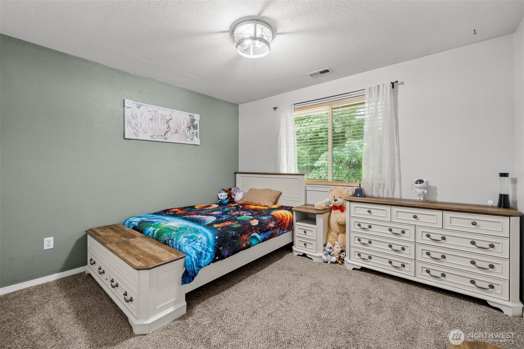 19221 Patterson Road East Orting, WA 98360 - Photo 23 of 40 a bedroom with two beds and a dresser