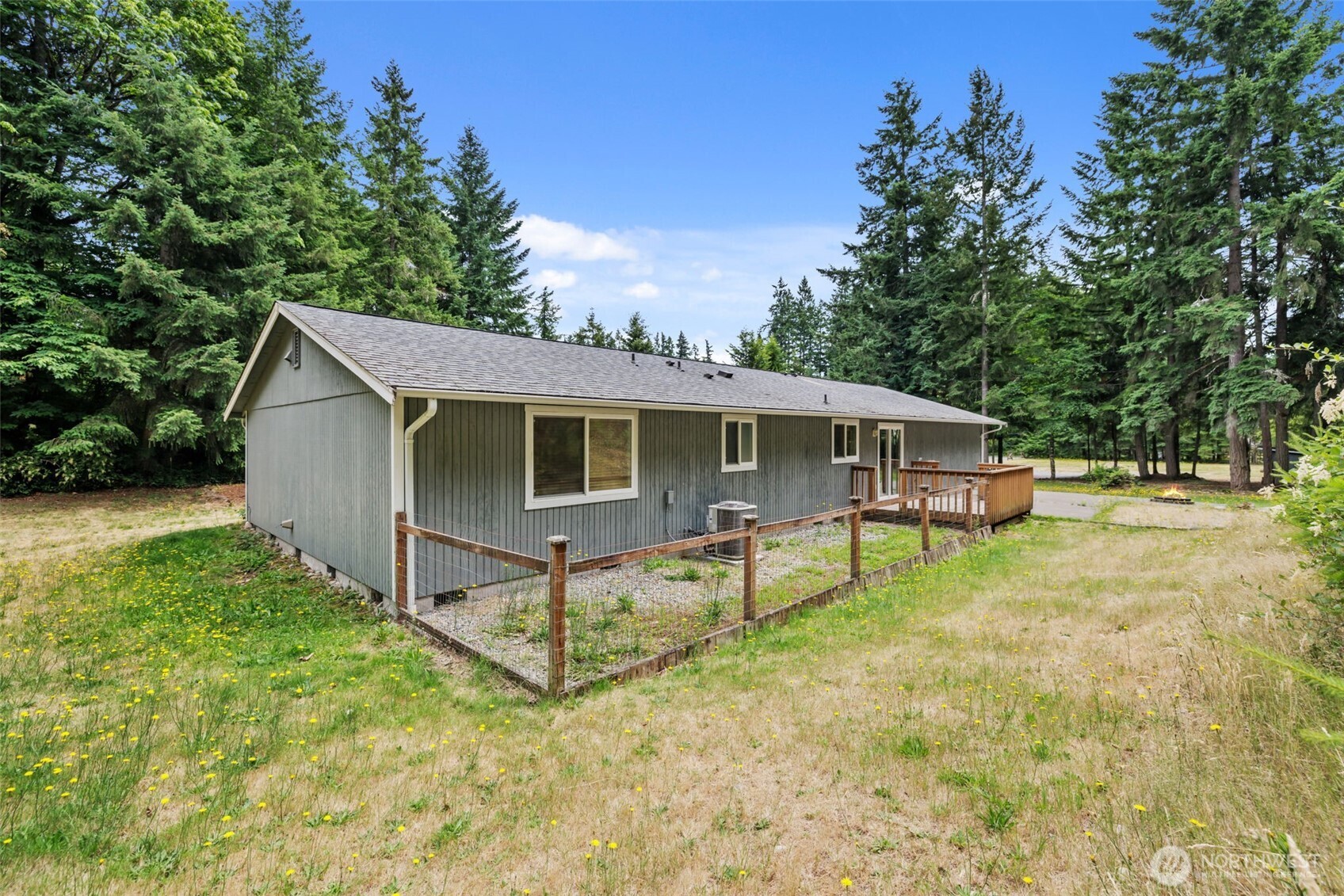 19221 Patterson Road East Orting, WA 98360 - Photo 29 of 40 a view of house with backyard and garden
