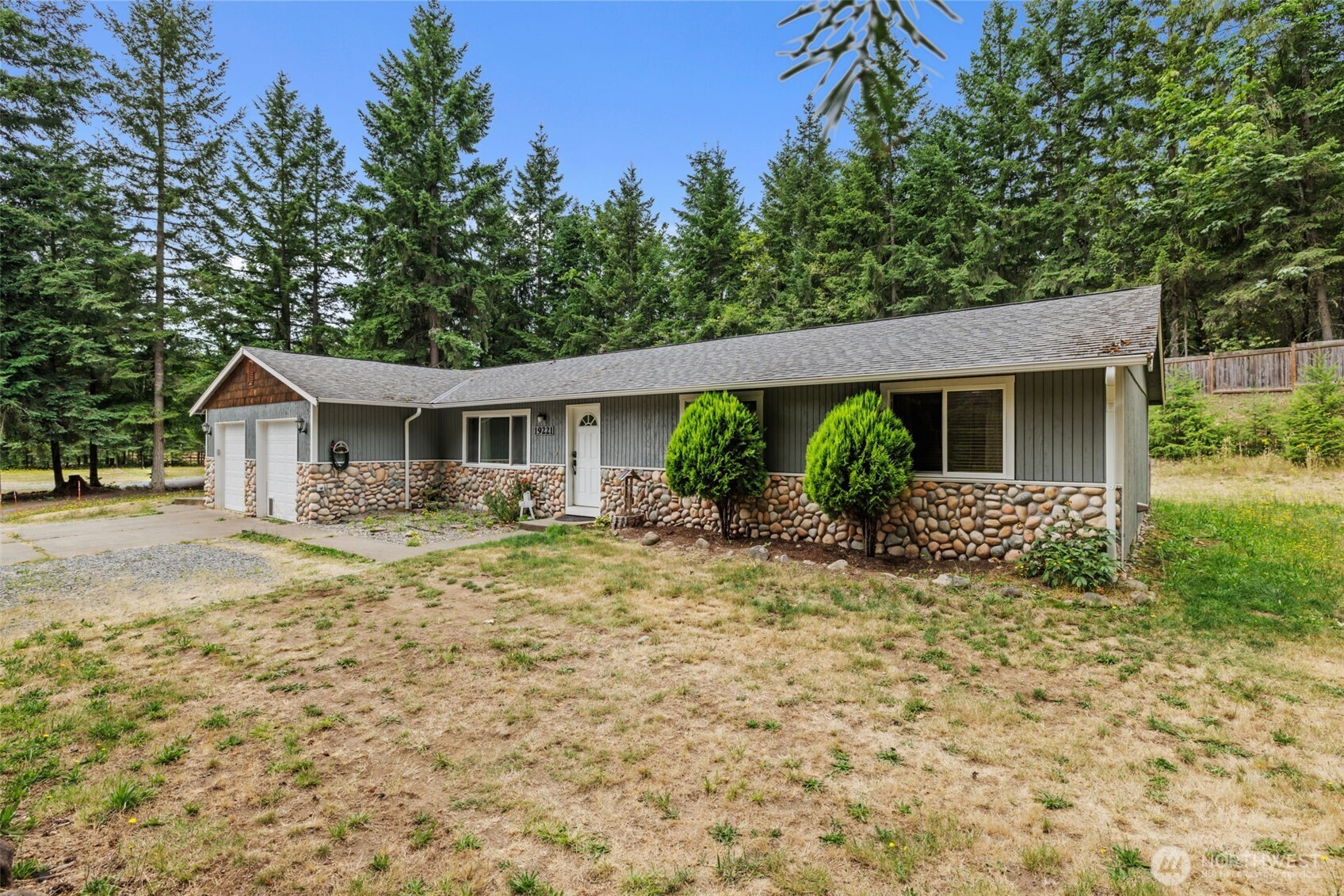 19221 Patterson Road East Orting, WA 98360 - Photo 3 of 40 a front view of house with yard and green space