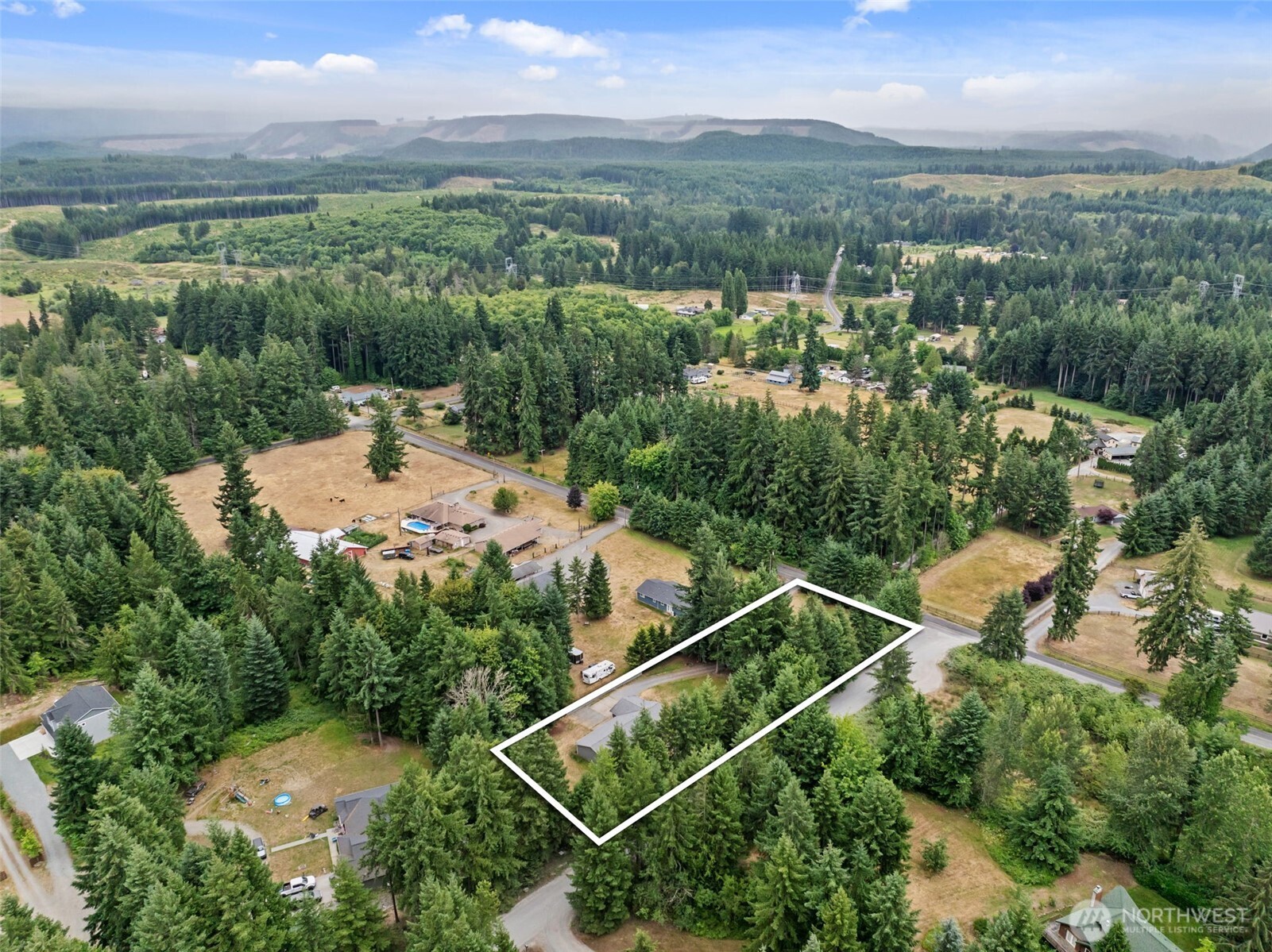 19221 Patterson Road East Orting, WA 98360 - Photo 38 of 40 an aerial view of a house with a yard